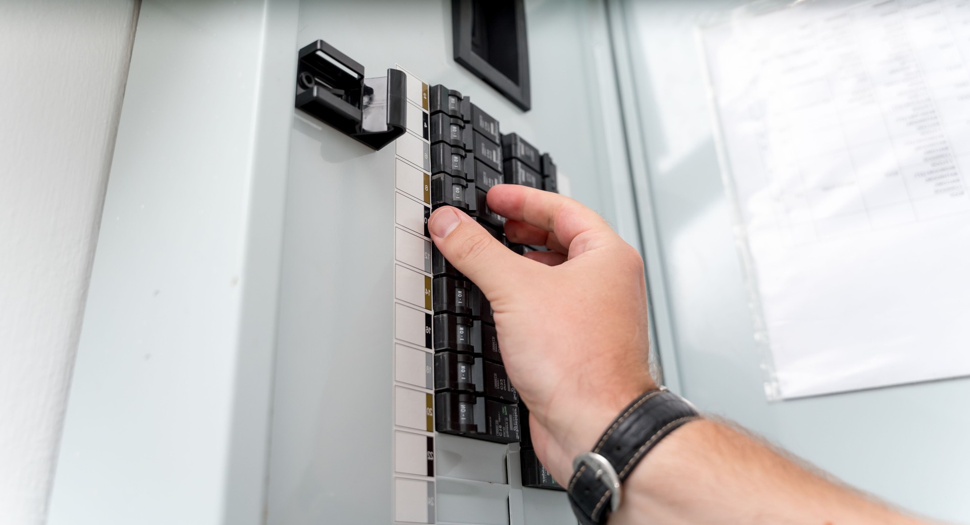A technician works with a demo kit of the smart home system